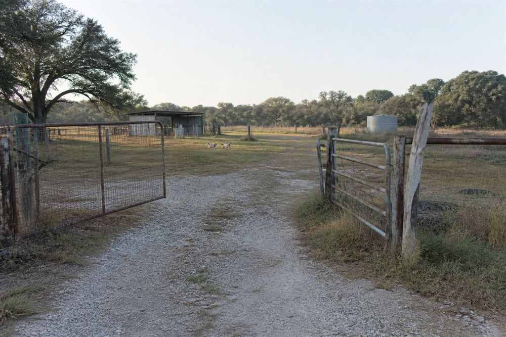 The entrance to a modest working farm in North Texas